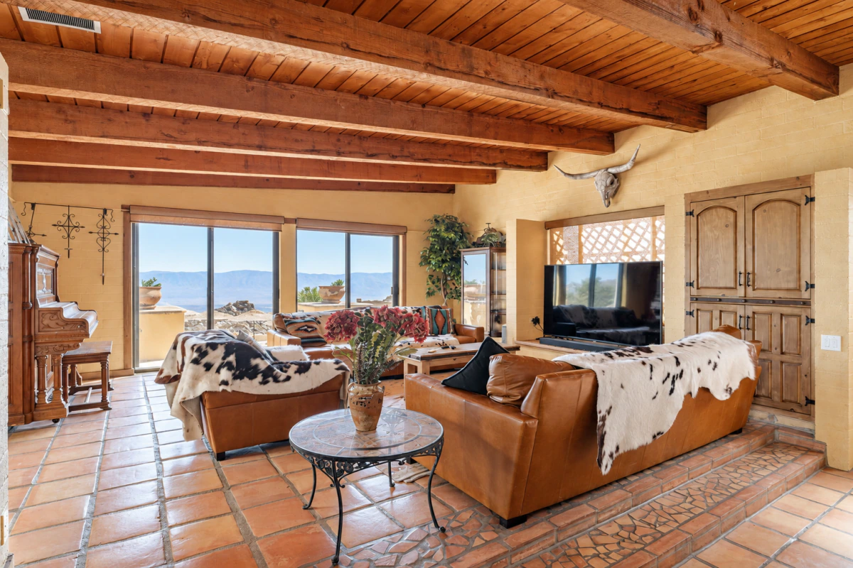 Timber-beamed great room overlooking the desert hills
